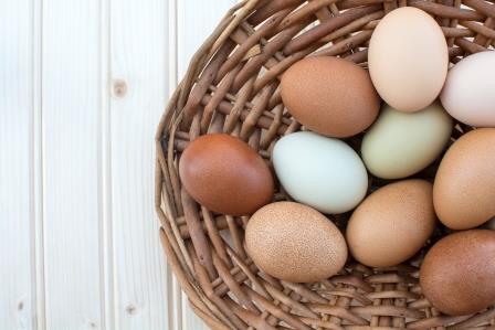 assorted eggs in a basket